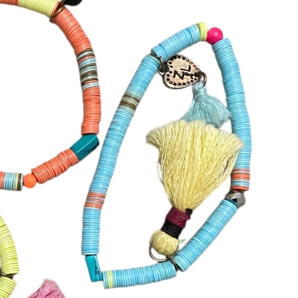 Trio of stretch pastel colored Bracelets with tassel & cross heart & star charms - Picture 3 of 4